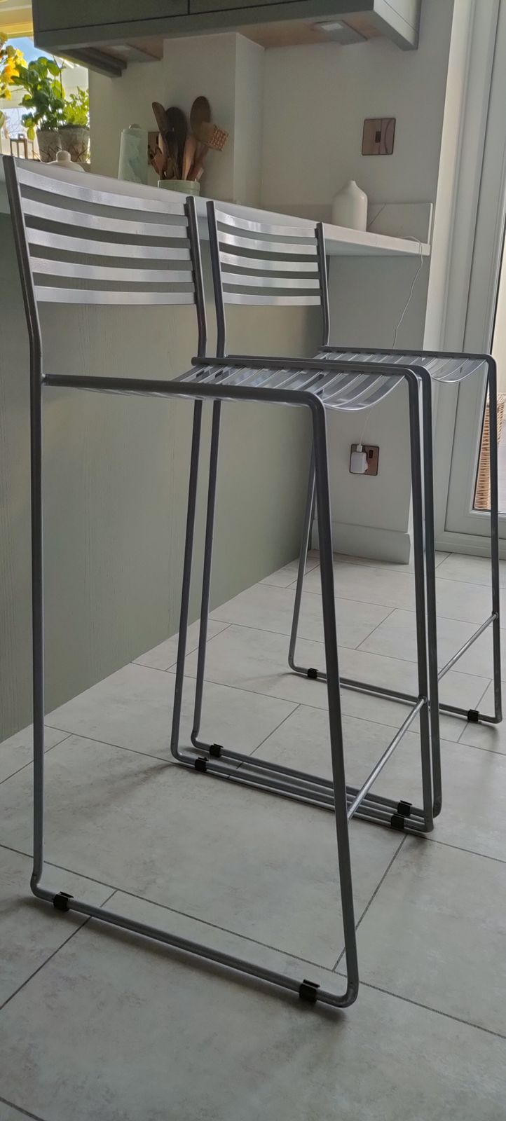 A Pair Of Heal's Kitchen Bar Stools. The Stools Are Slim And Contemporary. The Actual Height Of The Seat Is 65cm. The Stools Were Purchased For £600 When New. photo furniture