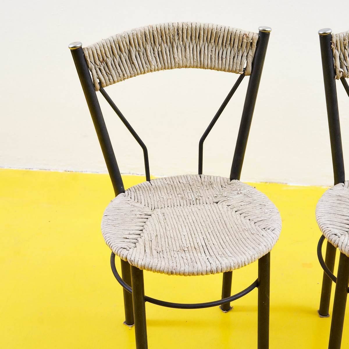 Pair Of Straw Covered Metal Chairs photo furniture
