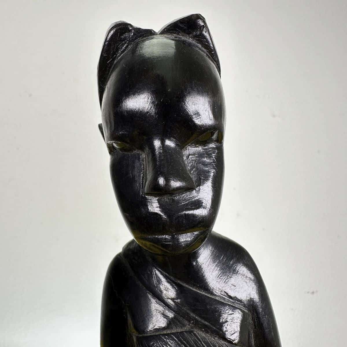 Pair Of Ethnic Statues Carved In Wood photo for sale