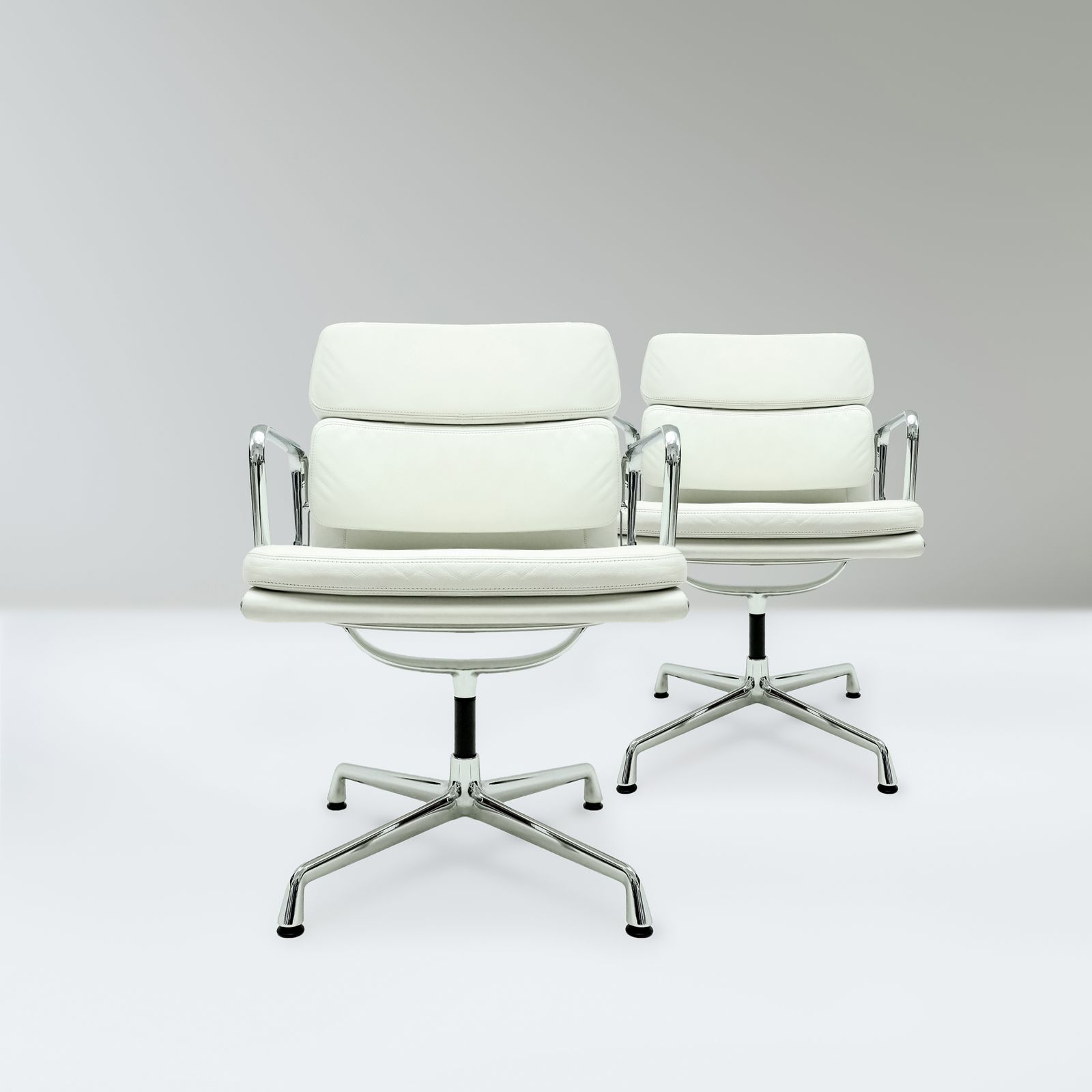Original Vitra, Eames Ea208 Ivory Leather And Chrome Soft Pad Chairs With Revolving Bases   Two Available