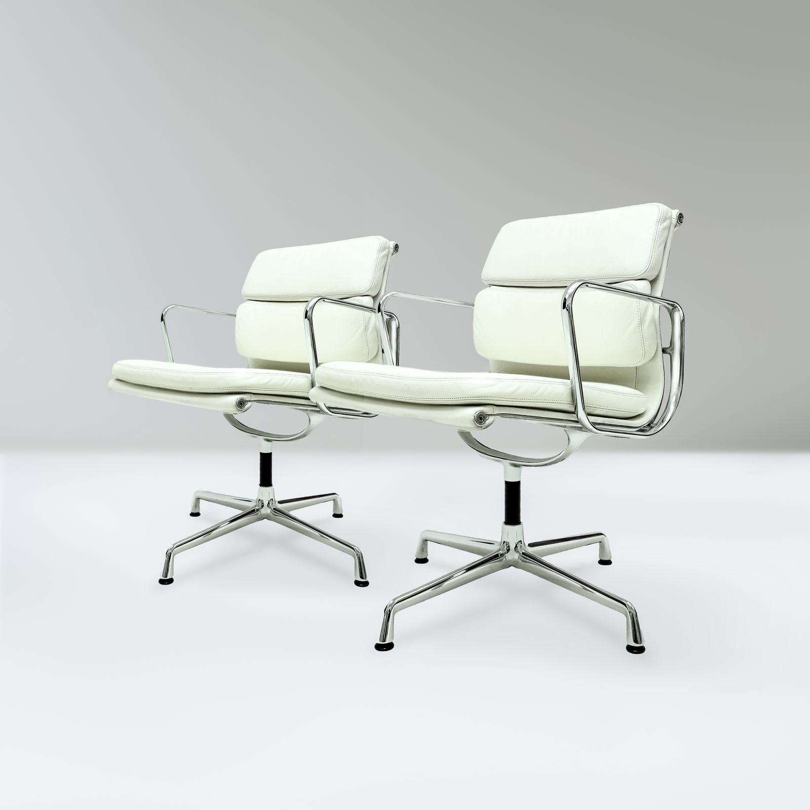Original Vitra, Eames Ea208 Ivory Leather And Chrome Soft Pad Chairs With Revolving Bases   Two Available photo furniture