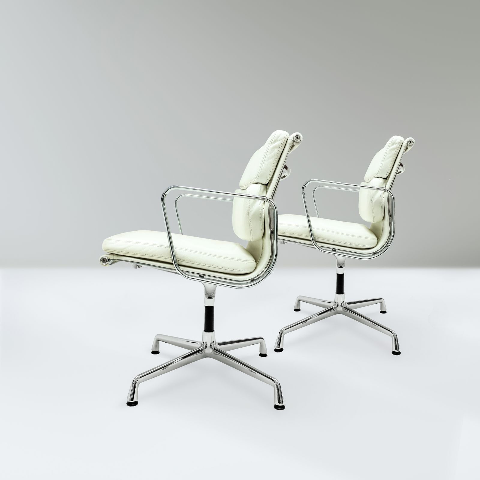 Original Vitra, Eames Ea208 Ivory Leather And Chrome Soft Pad Chairs With Revolving Bases   Two Available photo for sale