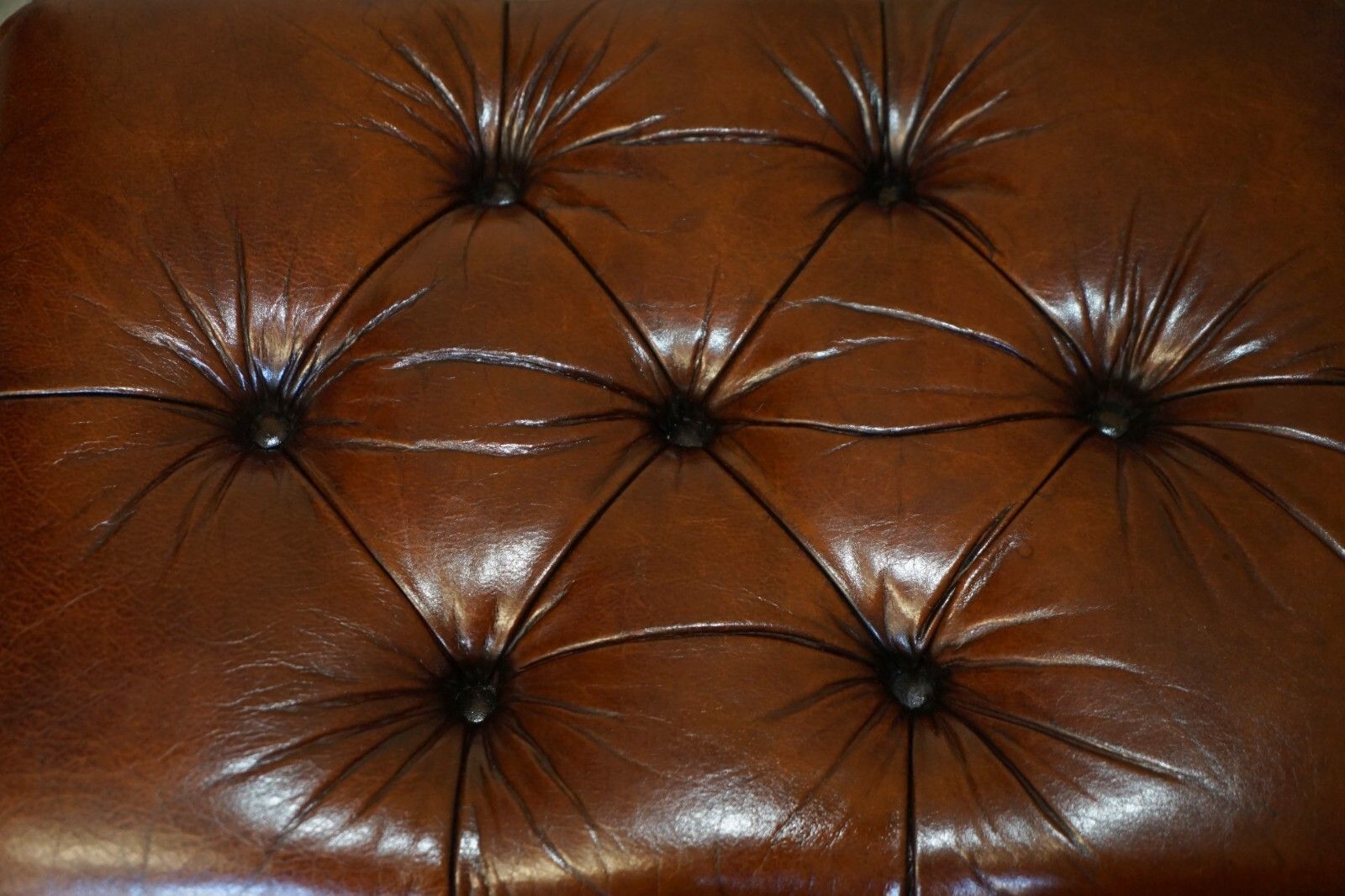 Pair Of Restored Brown Leather Chesterfield Tufted Porcelain Castors Footstools photo vinterior