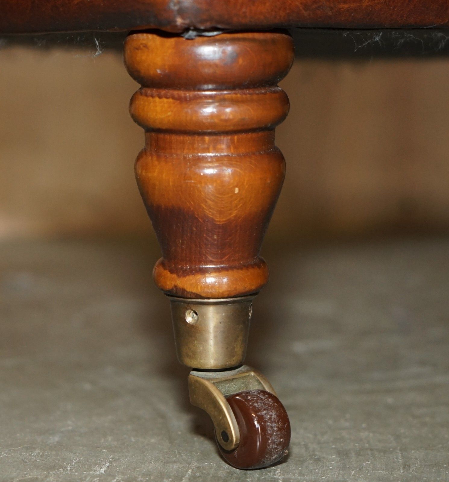 photo furniture Pair Of Restored Brown Leather Chesterfield Tufted Porcelain Castors Footstools