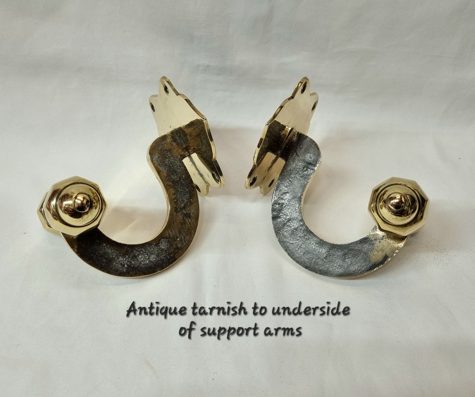 A Fine And Rare Pair Of 19th Century Heavy Brass Chimney Piece Opposing Jamb Hooks For Supporting Fireirons Either Side Of A Fireplace. photo vintage