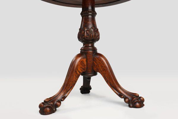 photo furniture Antique English Hand Carved Oak Side Table With Lions Head Feet, 1890s