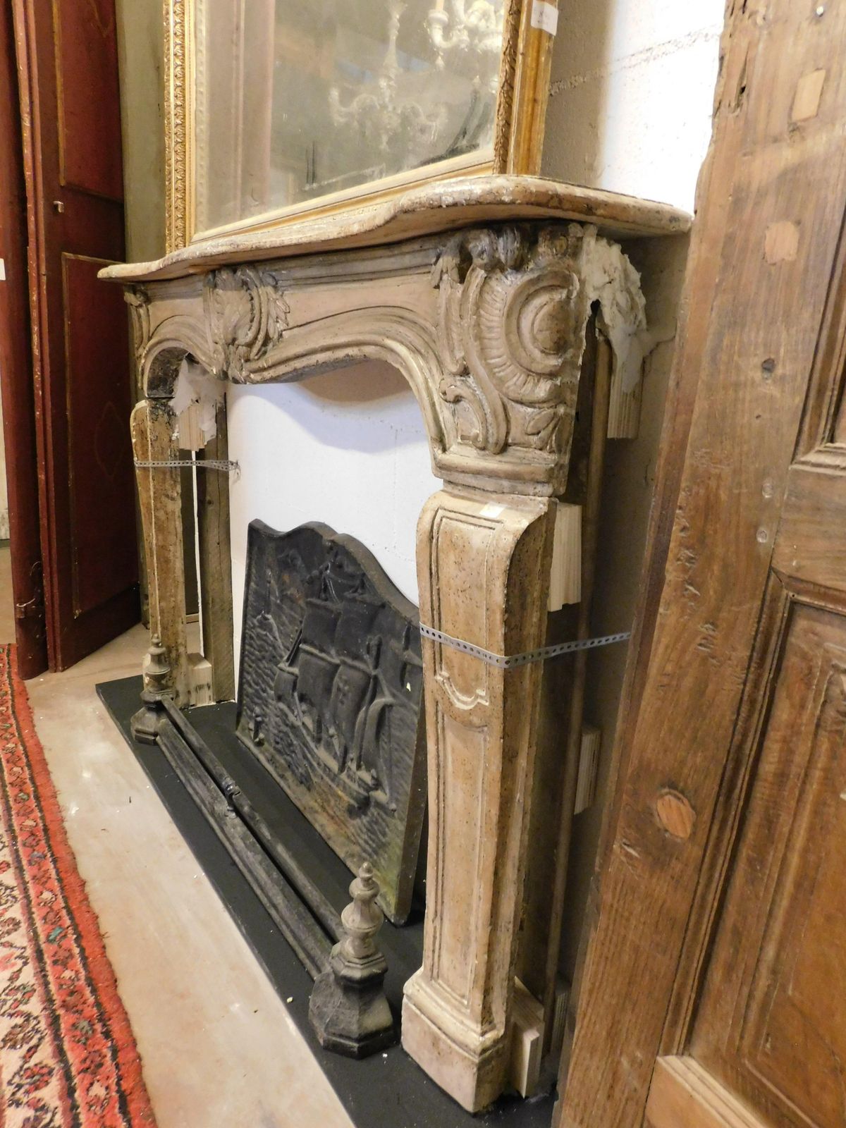 Fireplace Mantle In Carved Burgundy Stone, France photo vintage