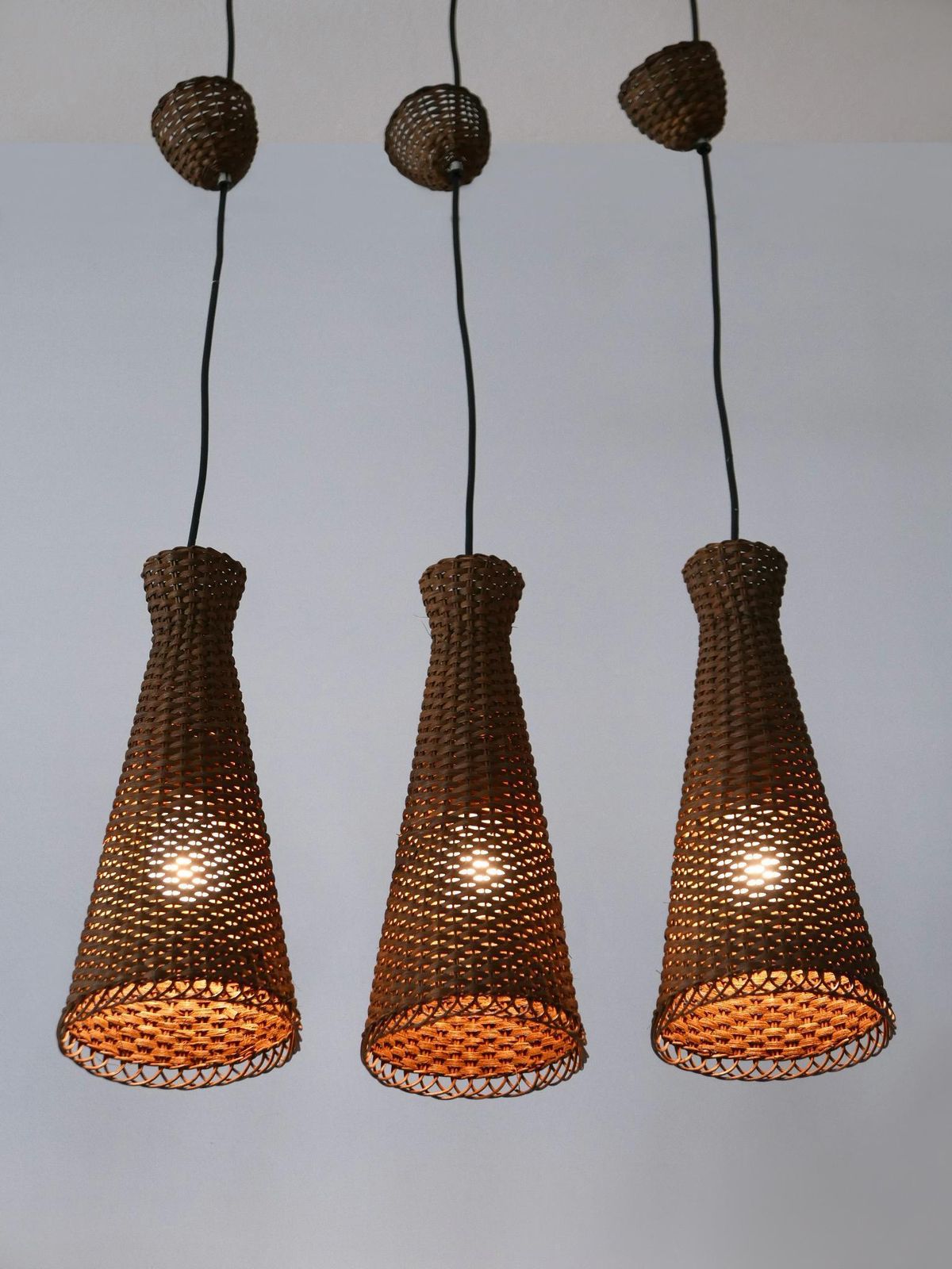 3264.0 Set Of Three Lovely Mid Century Modern Rattan Diabolo Pendant Lamps 1960s photo
