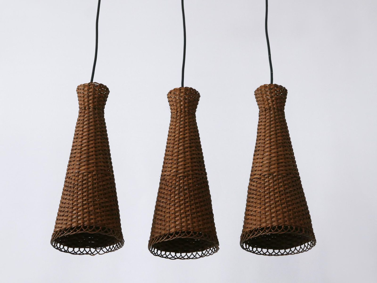 photo vinterior Set Of Three Lovely Mid Century Modern Rattan Diabolo Pendant Lamps 1960s