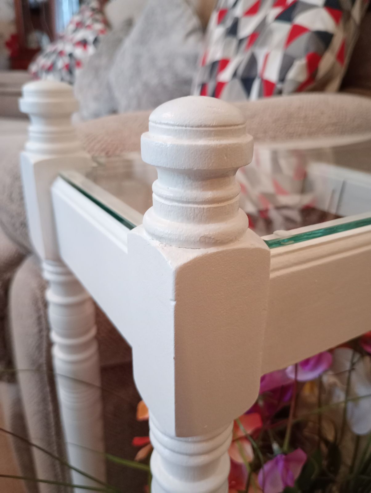 photo furniture Upcycled Glazed Table Faux Flower Display In Satin White Paint Finish.