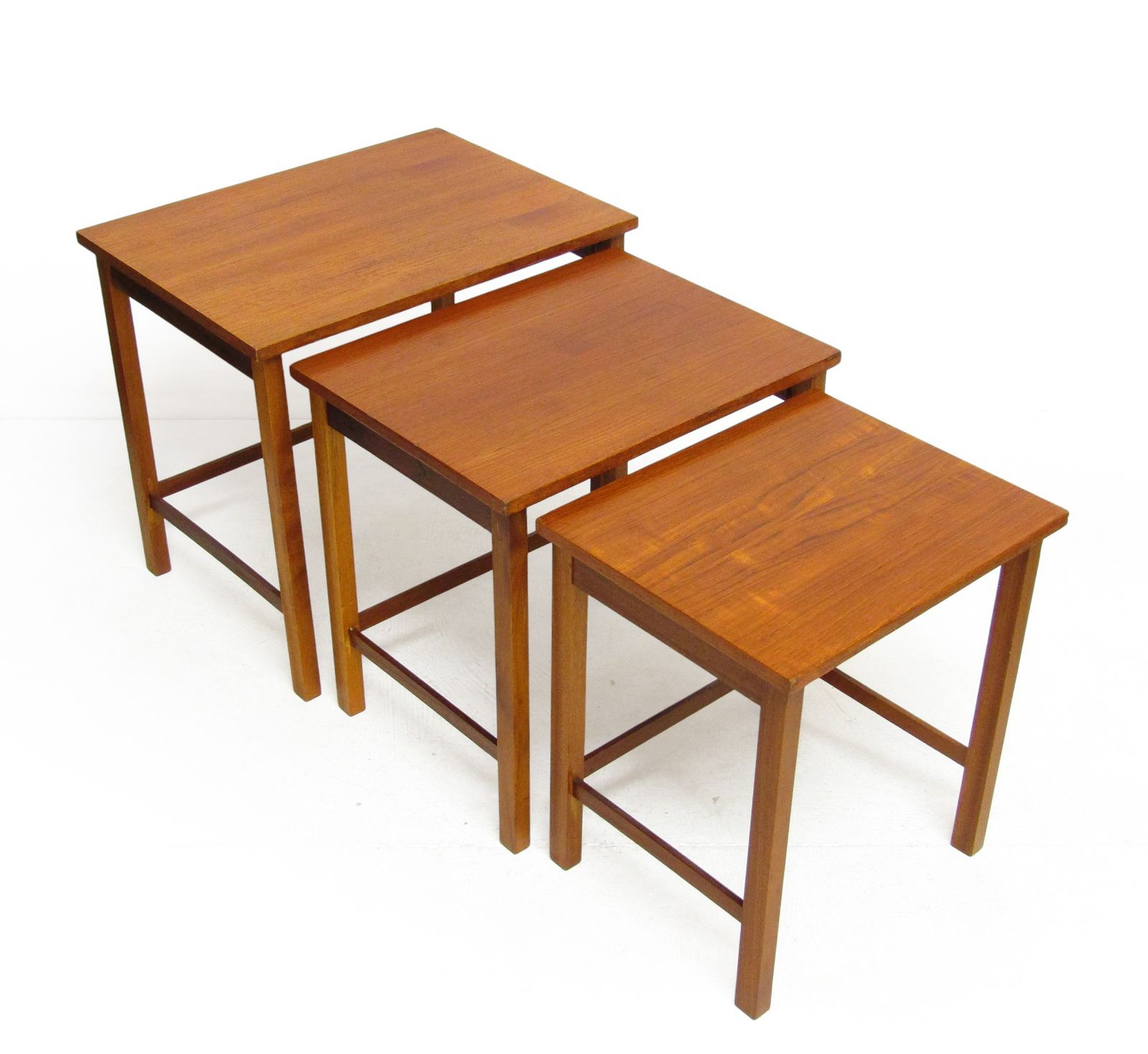 Set Of 3 1960s Teak Nesting Tables. Danish Style Of Peter Hvidt