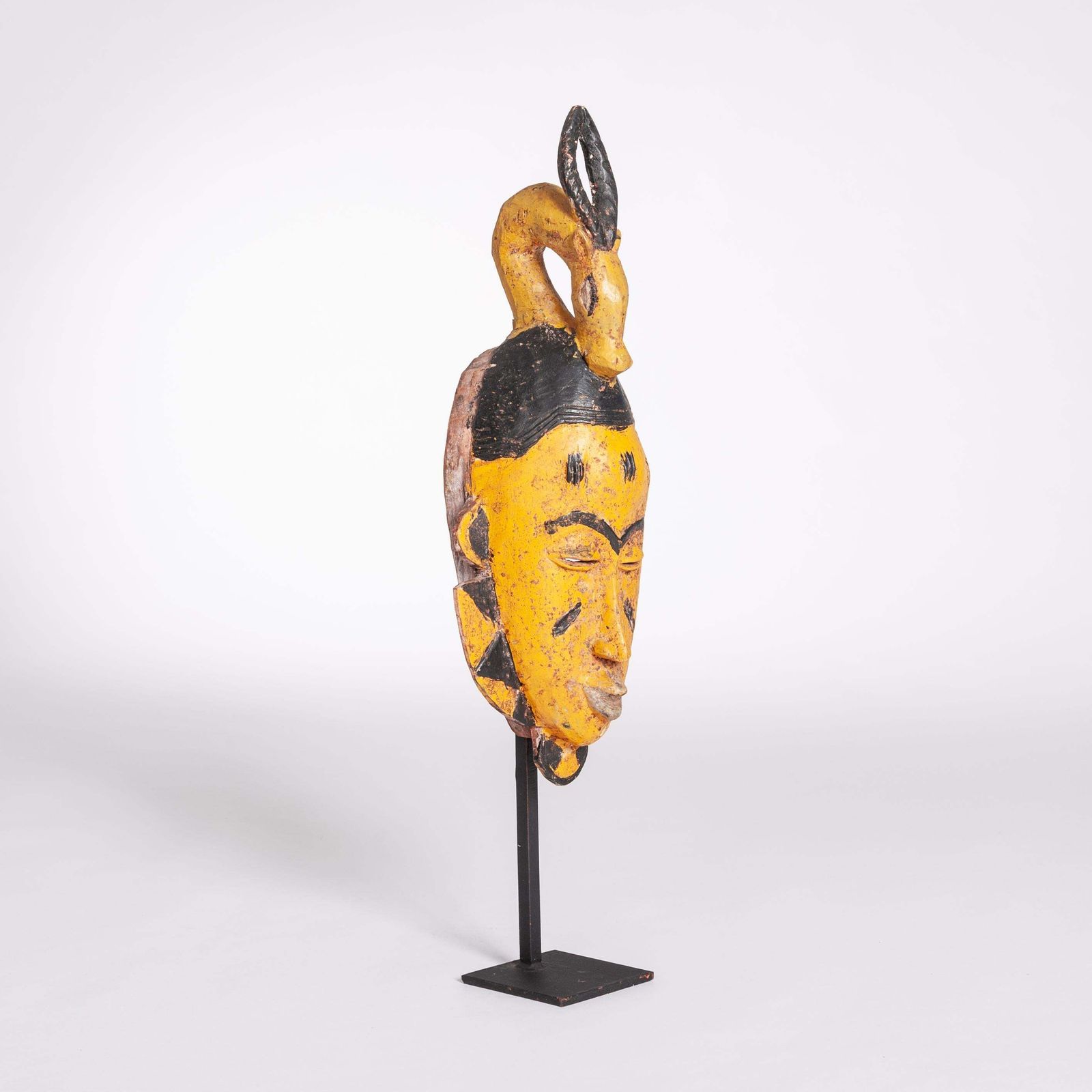 Mid Century Baoule Tribal Mask In Yellow Black With Antelope Head Decoration photo vintage