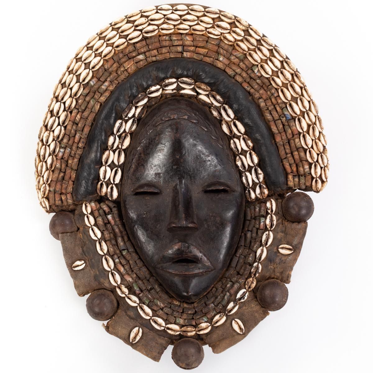 photo vinterior African Dan Yakuba Guard Mask Small Shells And Bells From The Ivory Coast 1970s