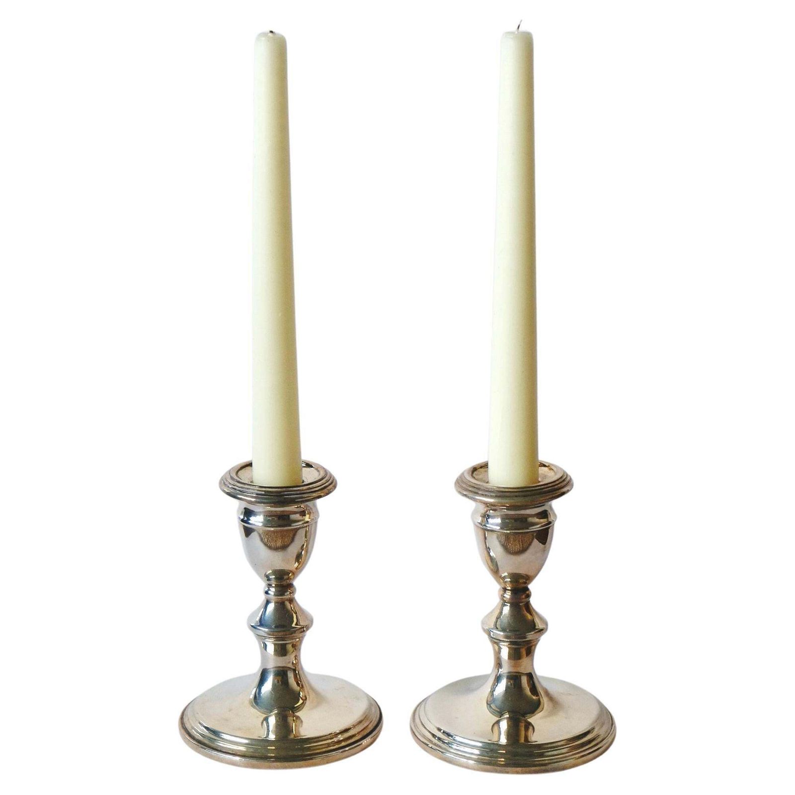 A Pair Of Antique Silver On Copper Candle Holders Made In England