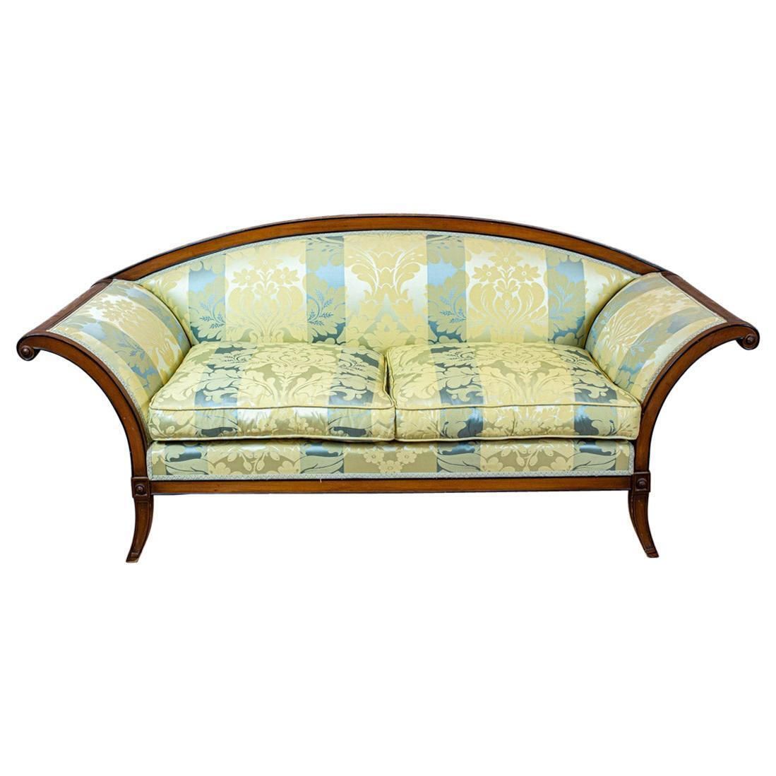 Stylized Walnut Sofa From The Early 20th Century With New Upholstery