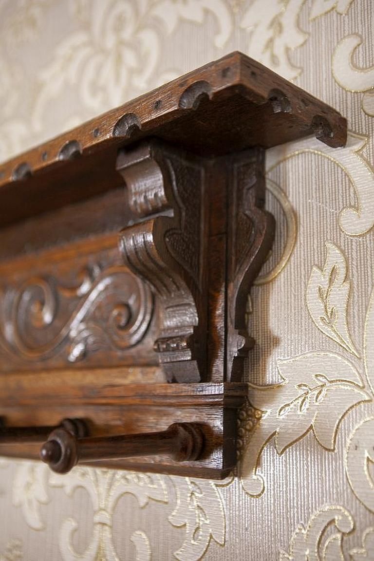 Furniture Oak Coat Rack From The Early 20th Century In Dark Brown photo