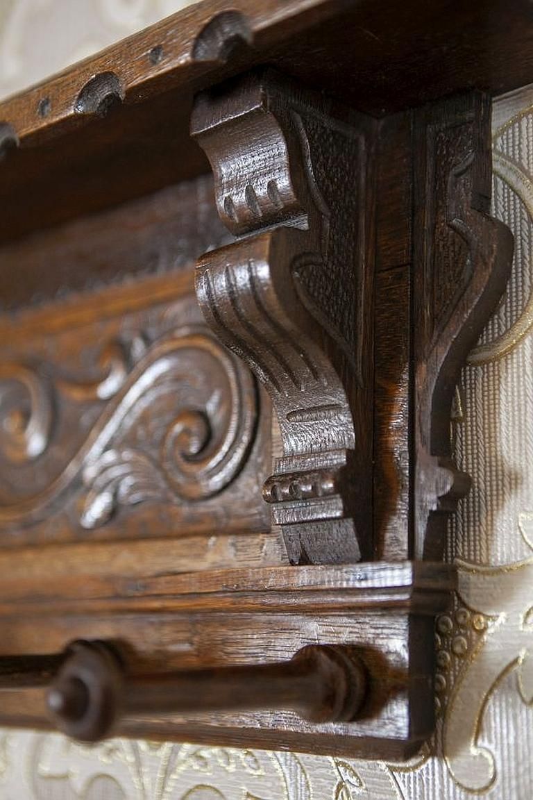 440.0 Oak Coat Rack From The Early 20th Century In Dark Brown photo