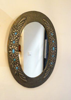 190.0 Oval Wall Mirror With Pewter Frame Decorated With Large Flowers In Relief, With Turquoise Heart, 1950s photo