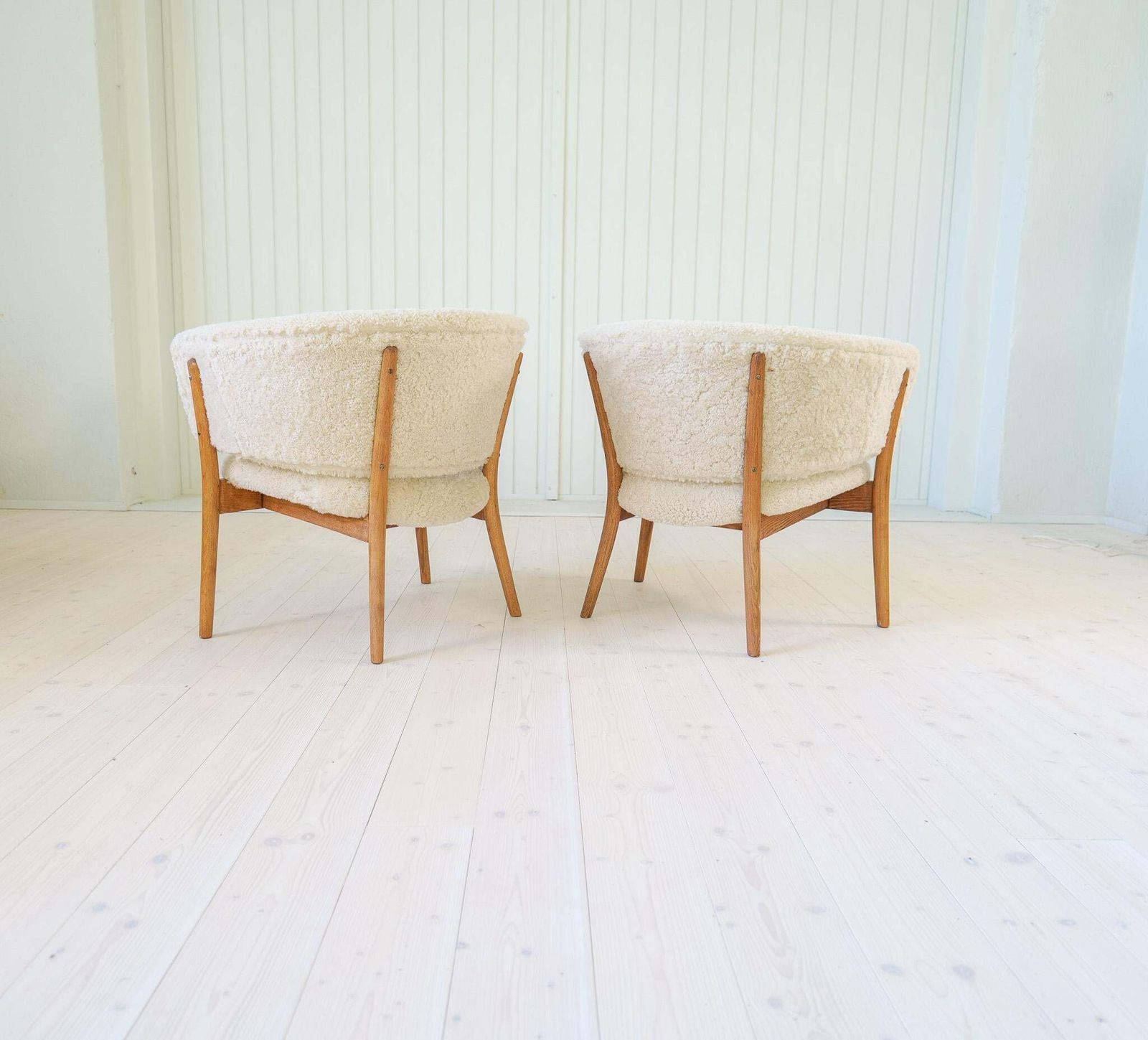 Mid Century Lounge Chairs In Sheepskin/Shearling And Stained Wood, Sweden, 1962 photo vinterior