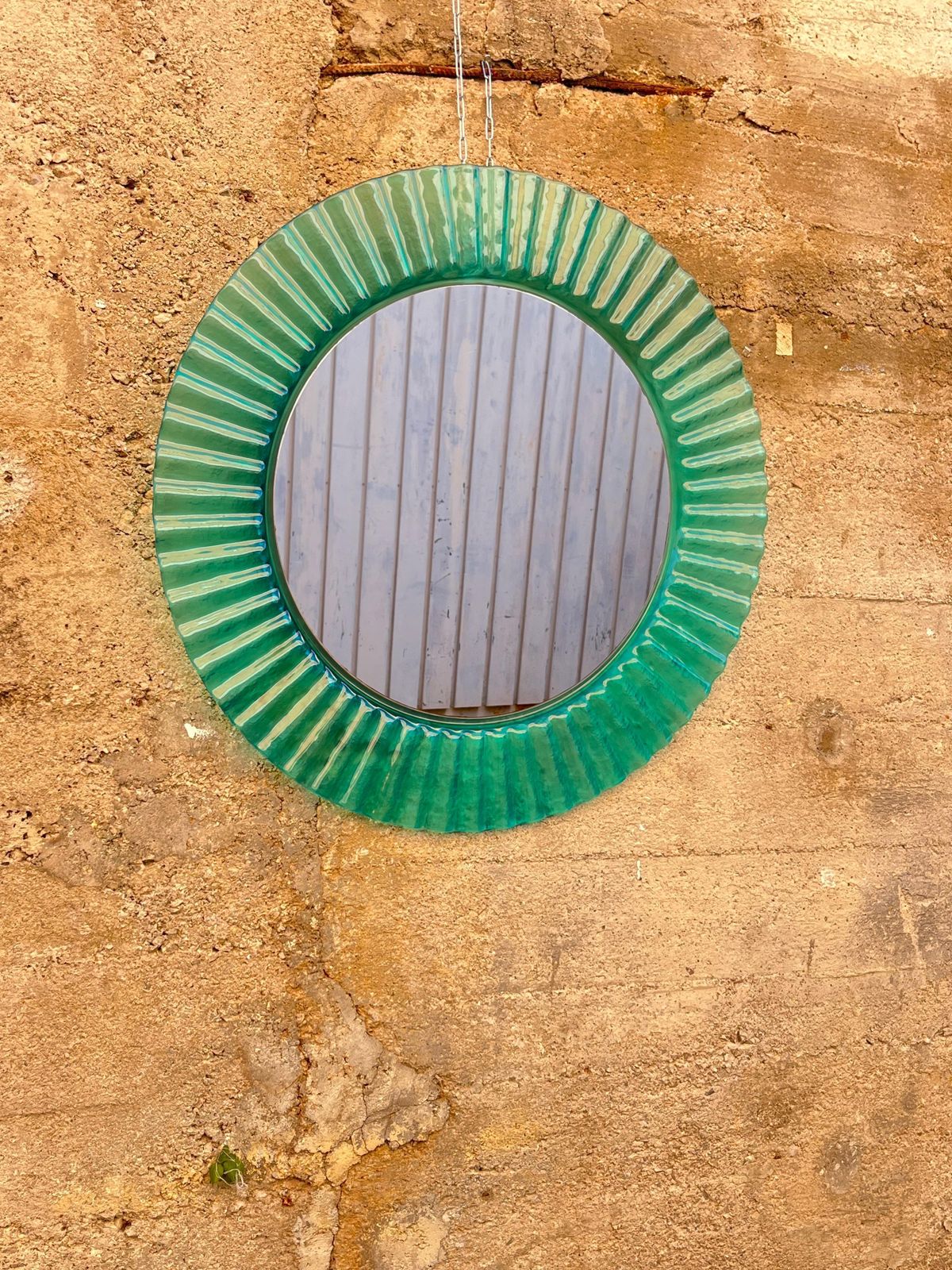 Circular Green Acrylic Wall Mirror 1970s, Old Warehouse Stock photo vinterior