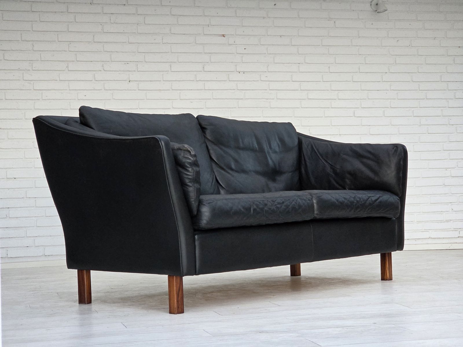 1970s, Danish 2 Seater Sofa, Original Black Furniture Leather, Teak Wood Legs. photo for sale