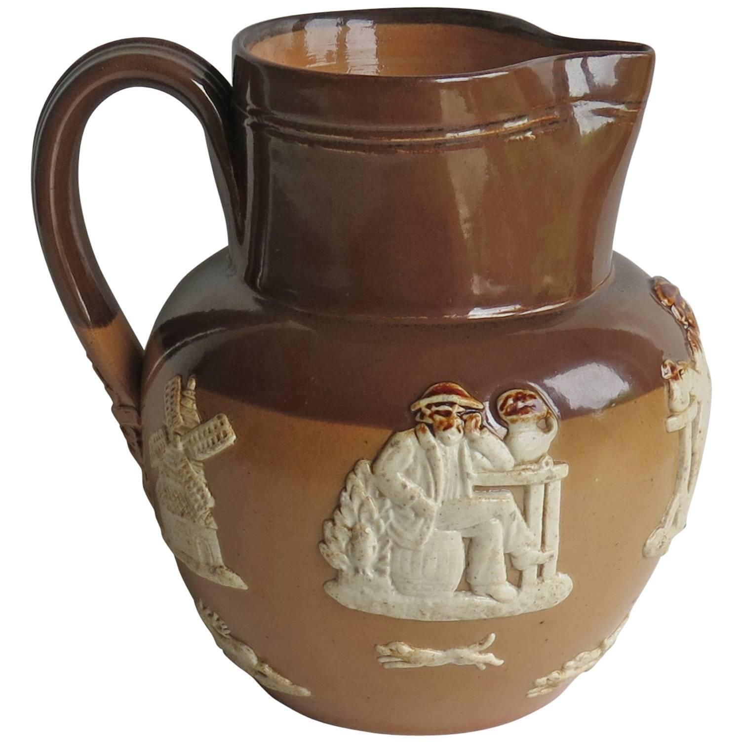 Royal Doulton Stoneware Jug Or Pitcher Moulded Farming Scene, Edwardian Ca 1905