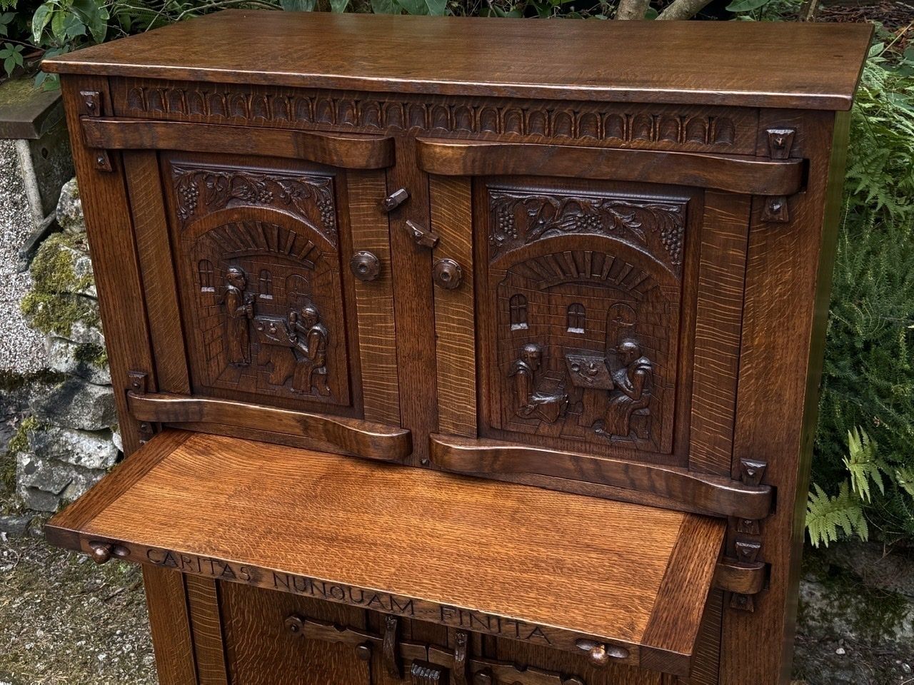 1495.0 A Nigel Griffiths Monastic Carved Oak Flemish Drinks Cabinet / Wine Cupboard photo