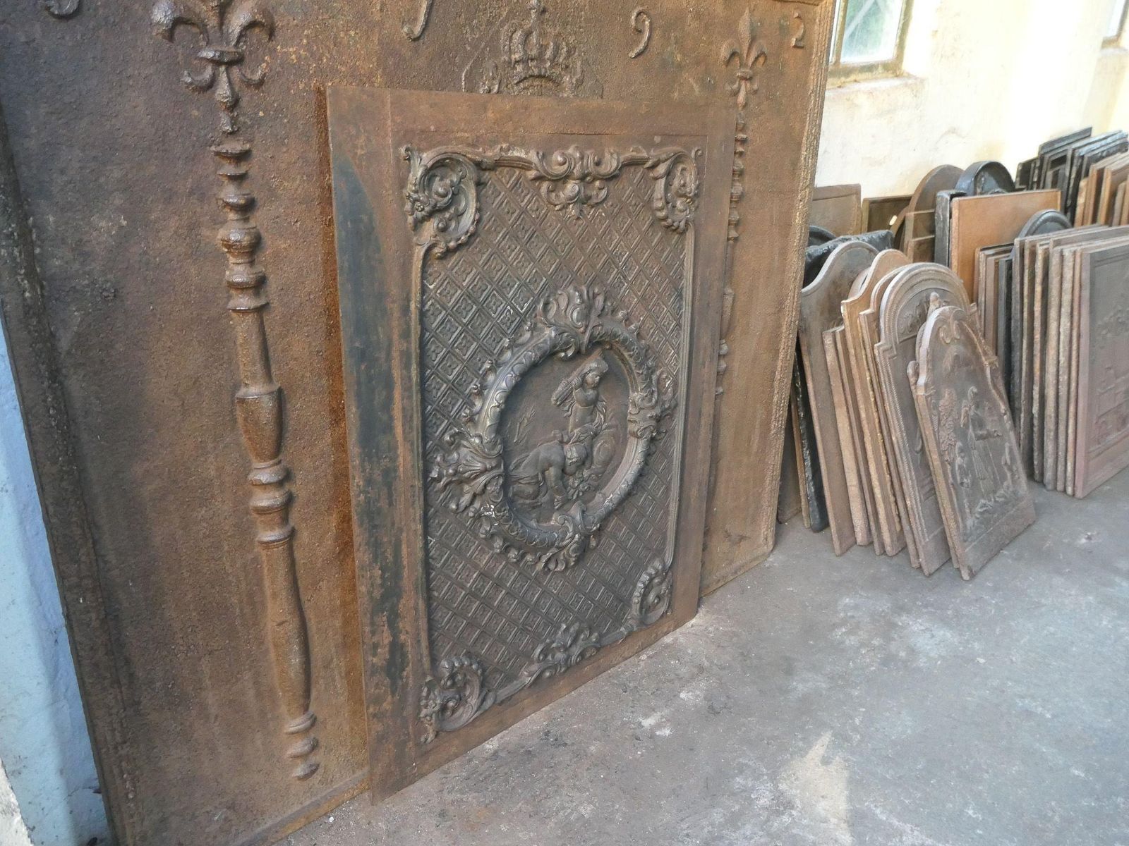 photo furniture French Early 20th Century Louis XV Style 'Cupids' Fireback / Backsplash.