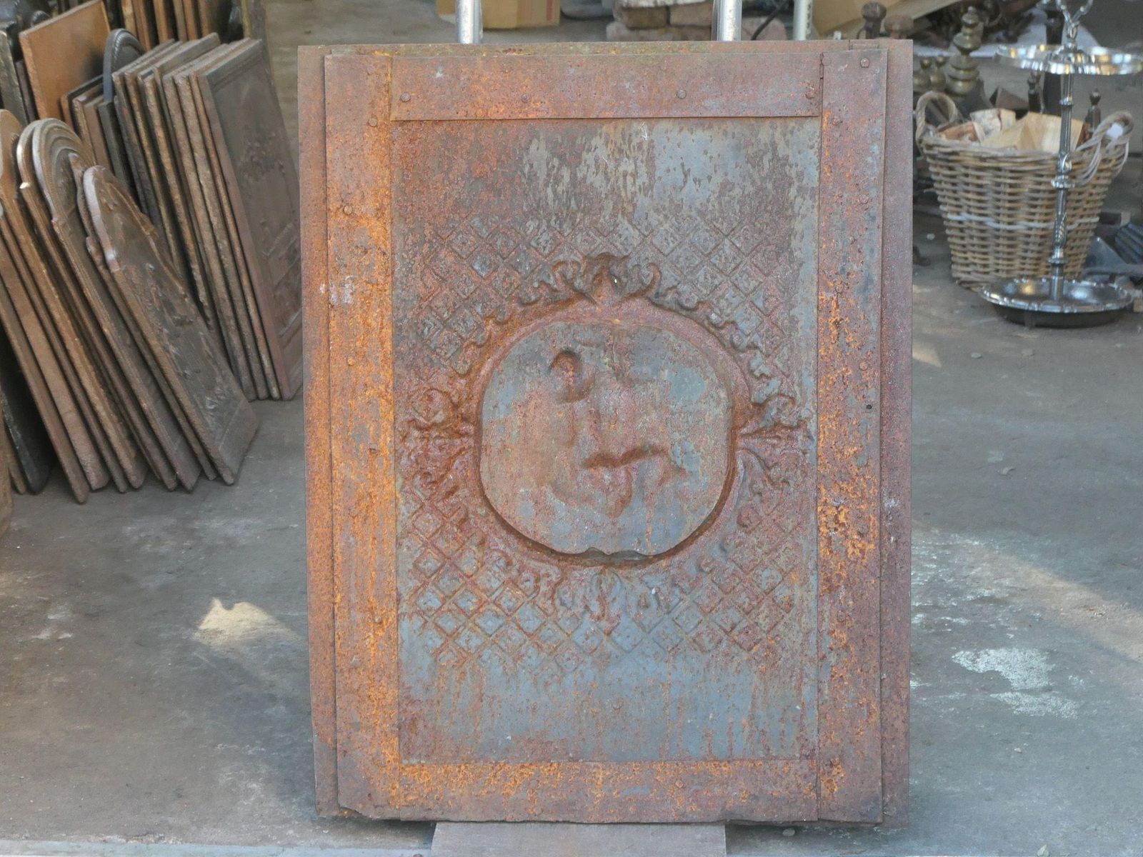photo for sale French Early 20th Century Louis XV Style 'Cupids' Fireback / Backsplash.