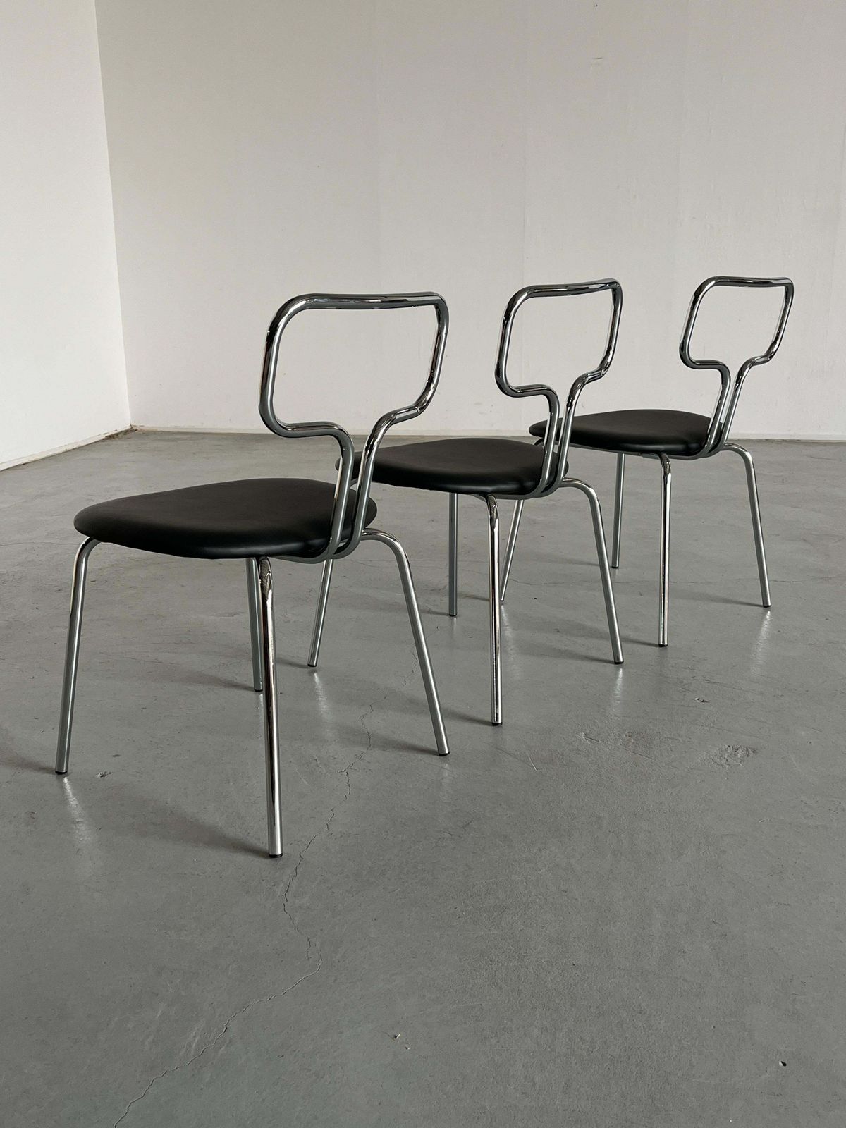 Bauhaus Design Curved Chrome Tubular Steel And Faux Leather Dining Chairs photo vinterior