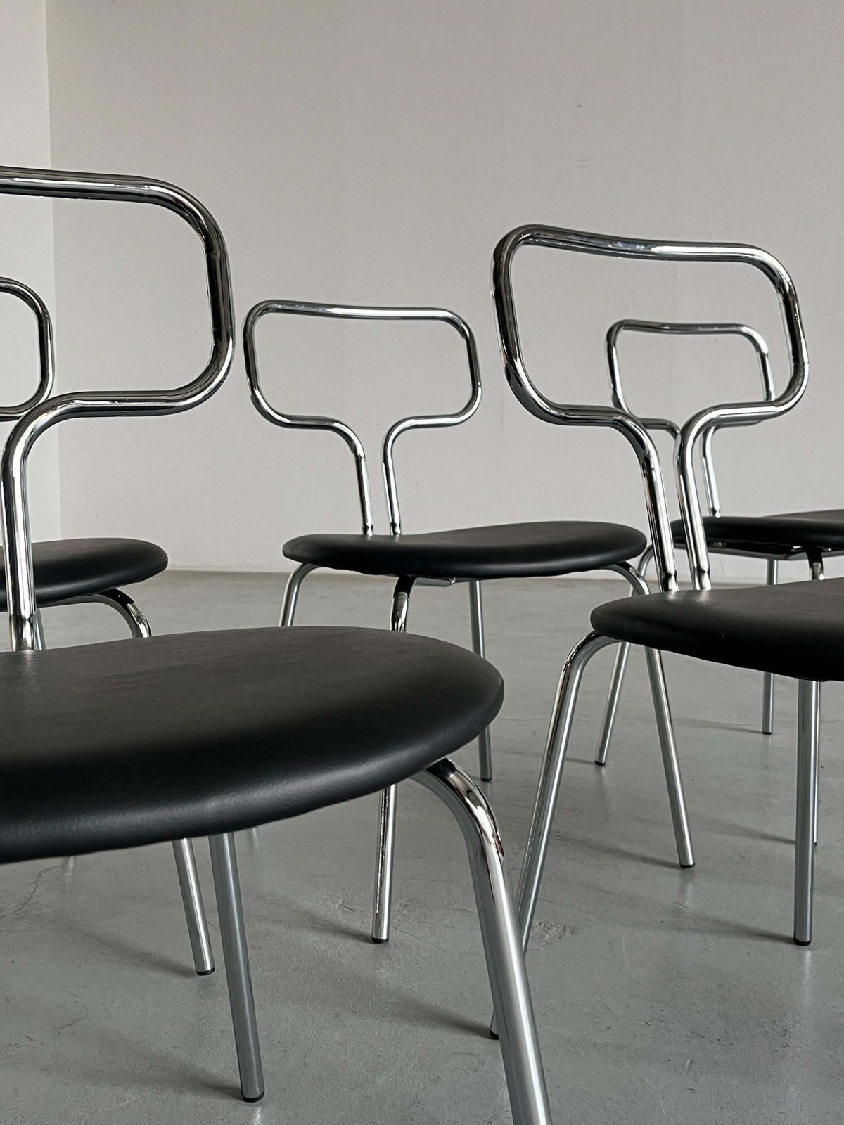 photo for sale Bauhaus Design Curved Chrome Tubular Steel And Faux Leather Dining Chairs