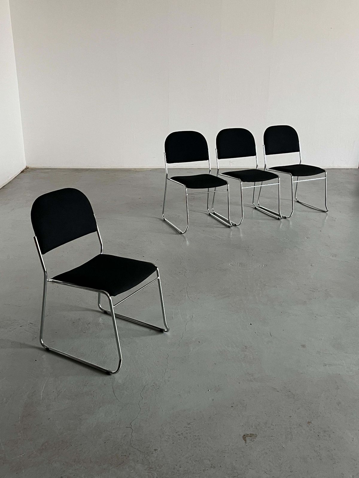 Set Of 4 Minimalist Dining Chairs In Black Fabric And Chromed Steel, Stackable photo furniture