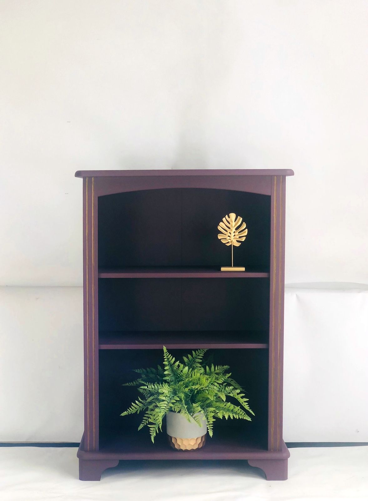 Painted Purple Bookshelf With Gold Trim Detail photo vintage