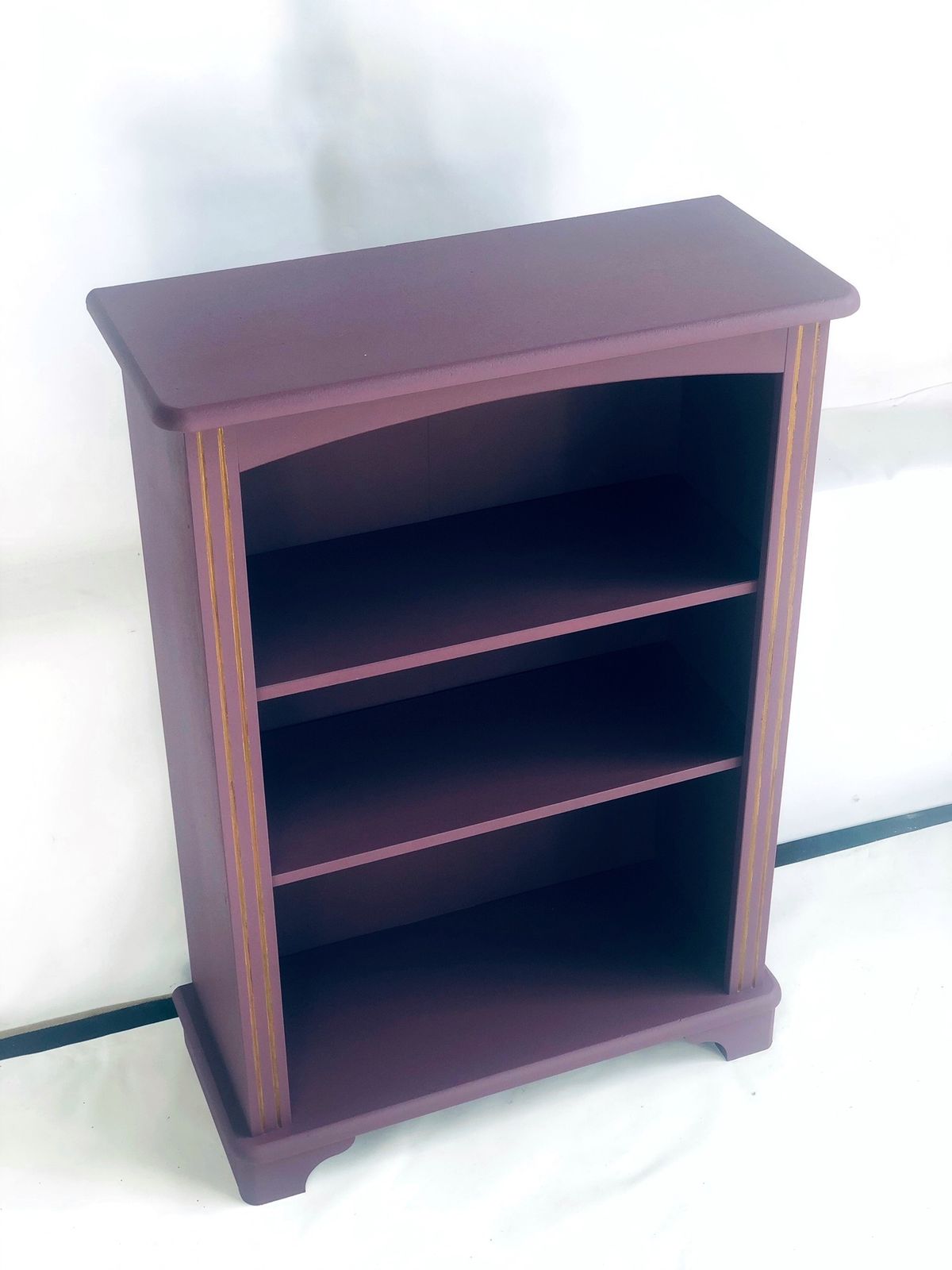 photo for sale Painted Purple Bookshelf With Gold Trim Detail