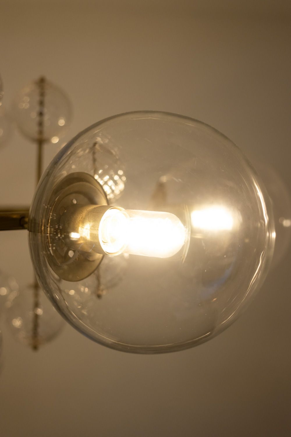 Large Chandelier In Gilded Brass And Decorative Balls. 1970s. photo vinterior