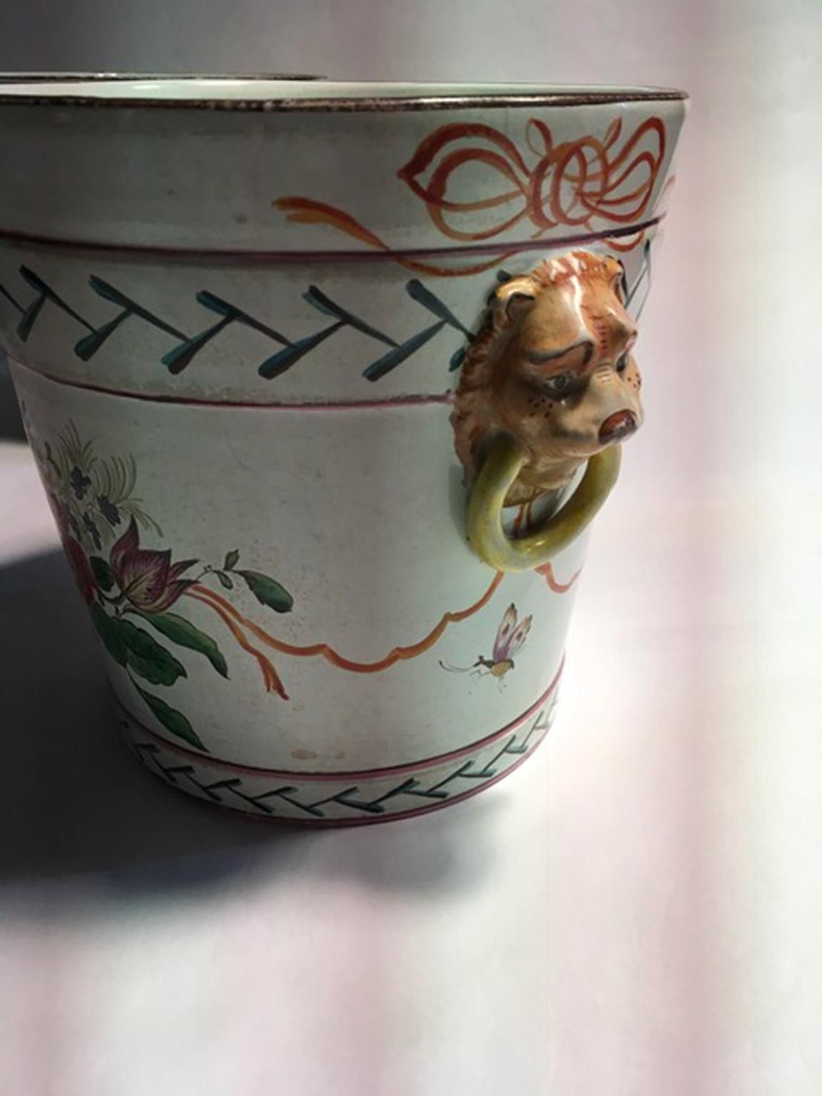 1022.0 France Late 19th Century Pair Of Pottery Cache Pots With Flowers And Lions Heads photo