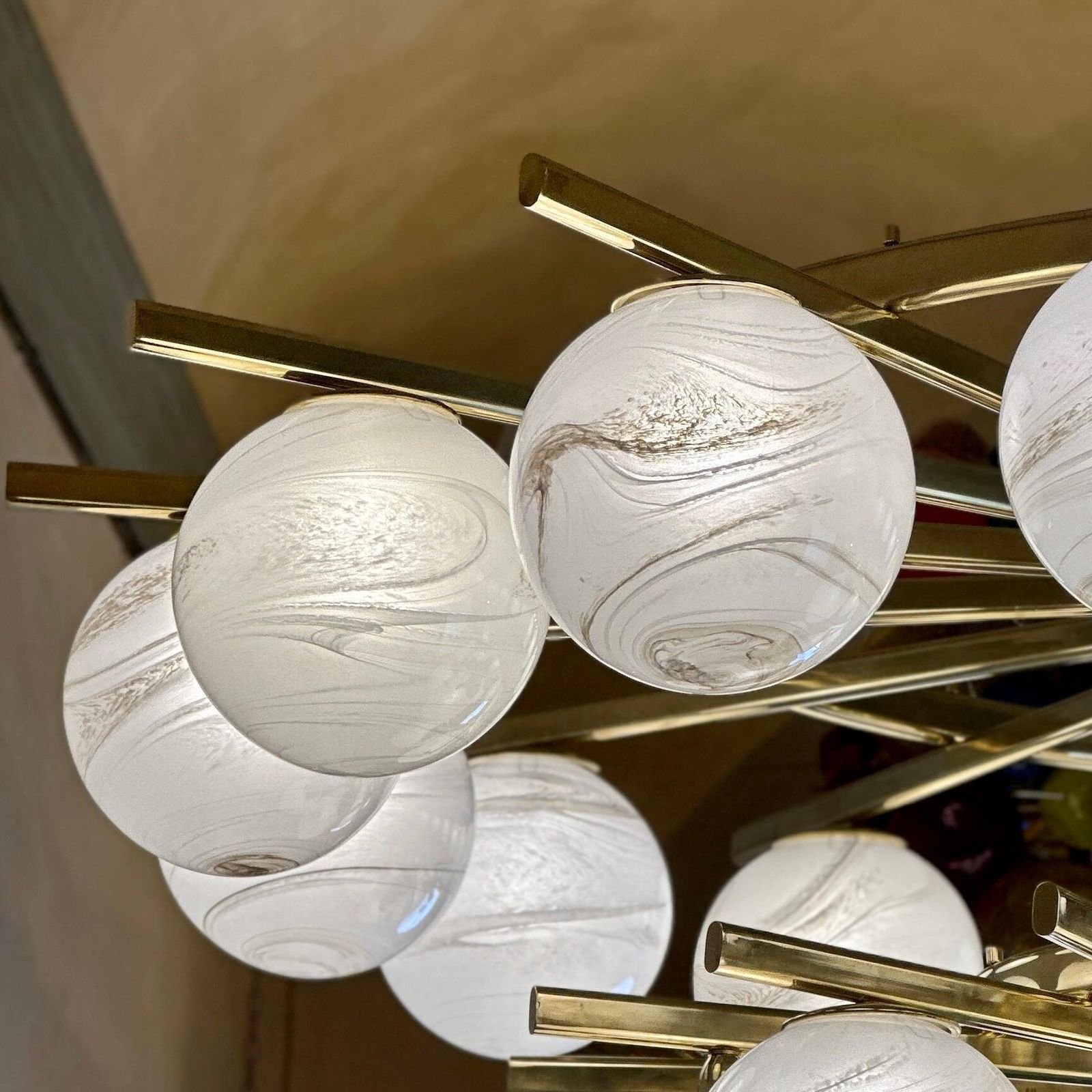 photo buy Late 20th Century Brass Double Tier Chandelier With Marbled Murano Glass Boules