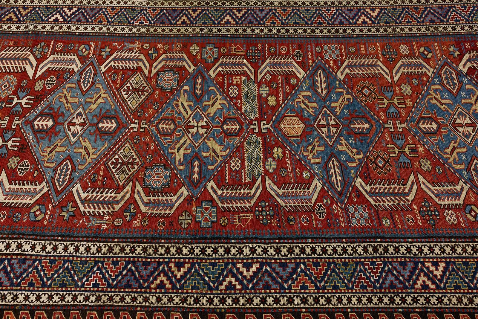 Caucasian Sumak Rug photo furniture