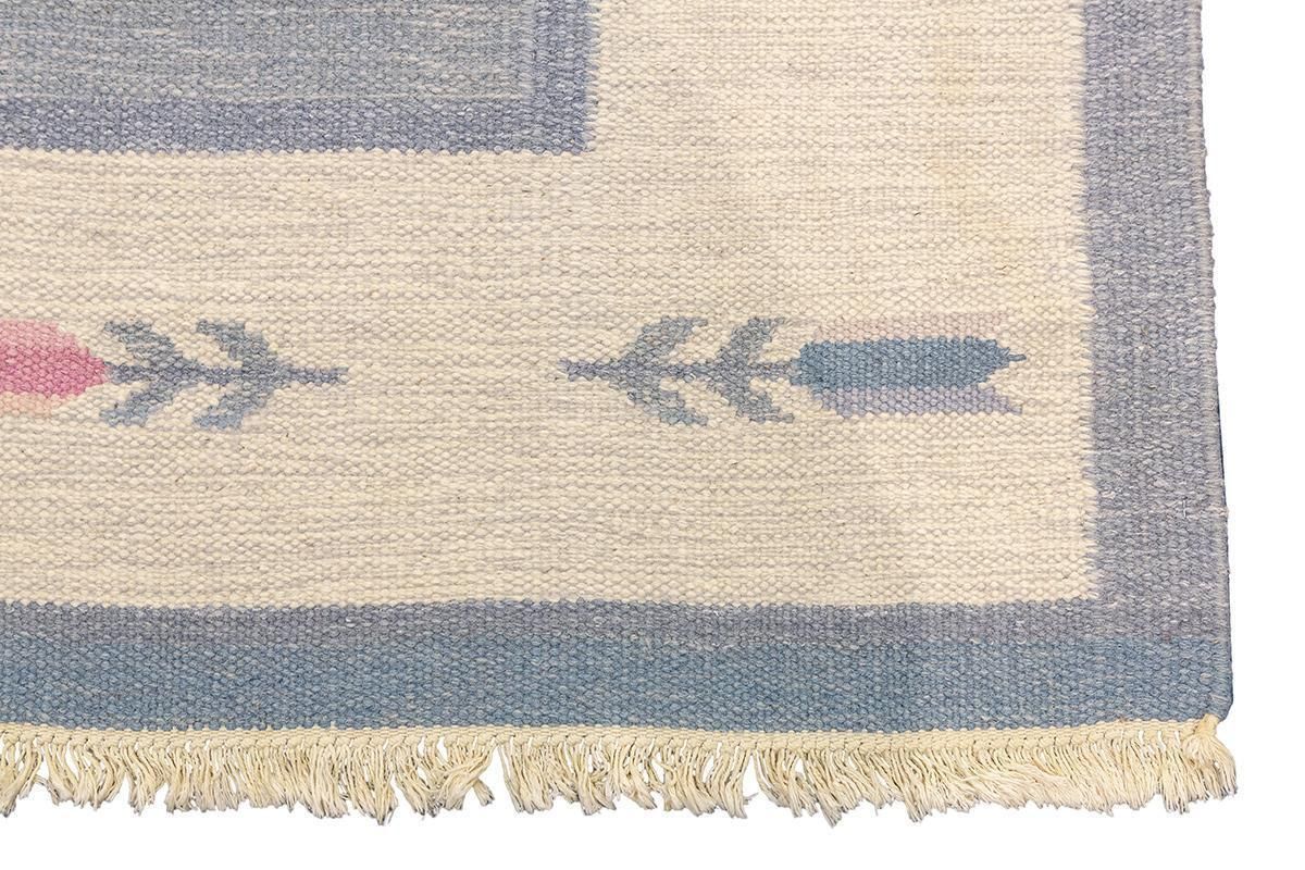 Scandinavian Rug Rollakan Soft Color Palette photo Textiles