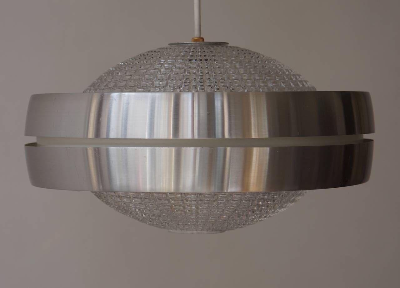 Four Raak Ufo Shaped Pendant Lights In Glass And Aluminum photo furniture