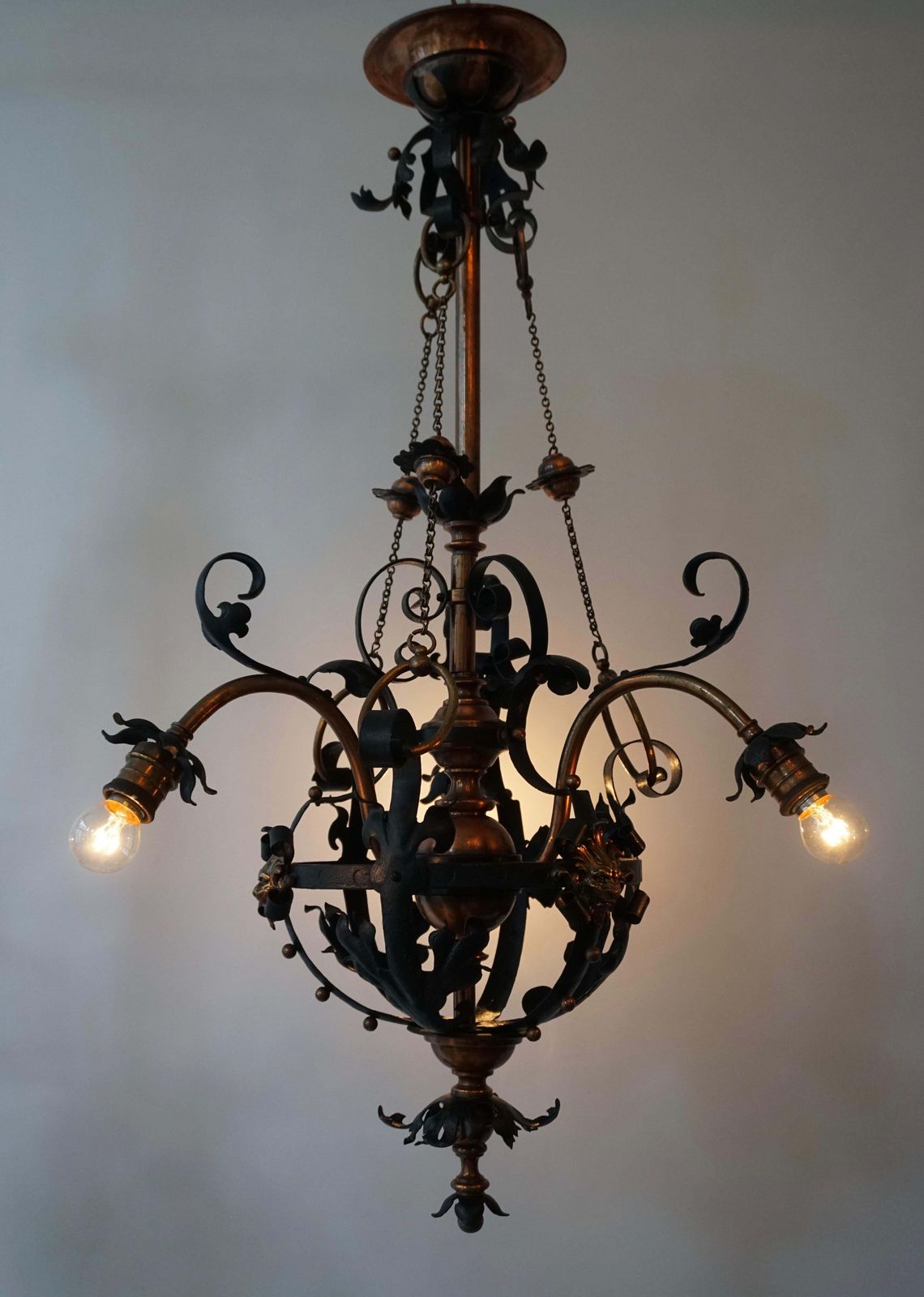 photo furniture Arts & Crafts Wrought Iron And Copper Castle Chandelier With Bronze Lion Heads