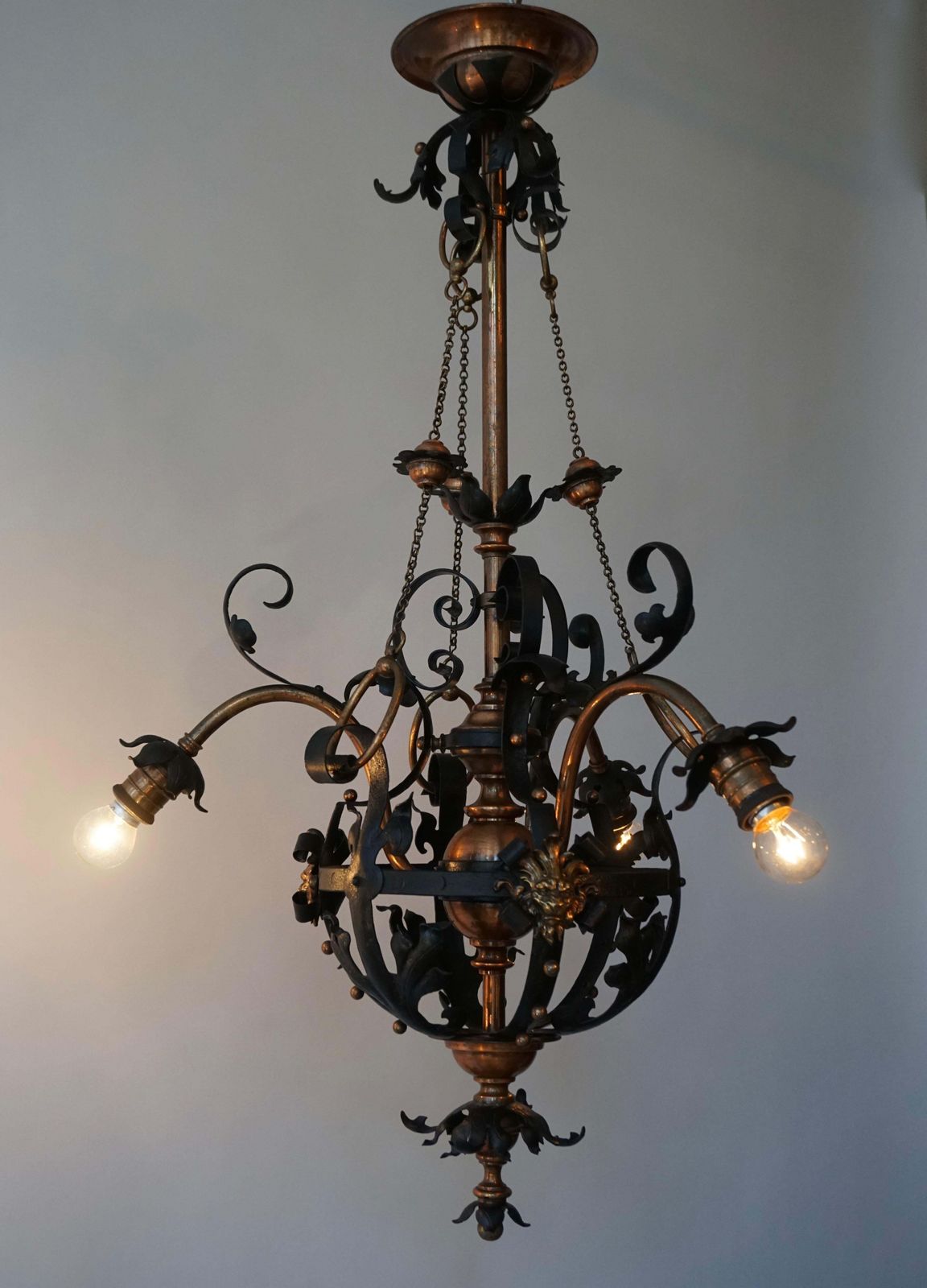 photo vinterior Arts & Crafts Wrought Iron And Copper Castle Chandelier With Bronze Lion Heads