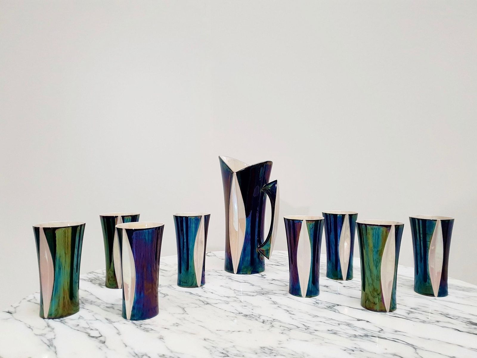 photo for sale Mid 20th Century Iridescent Ceramic Drinks Set Of 9 Made In France, 1970s