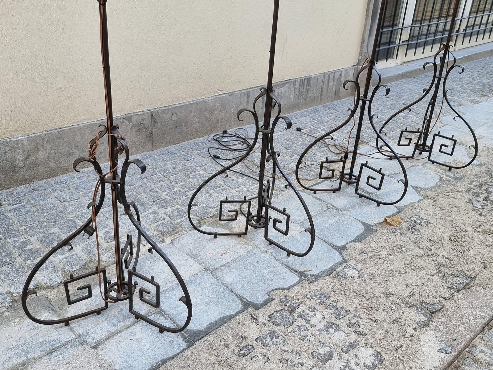 photo vintage Four Antique Wrought Iron Art Deco Castle Monastery Floor Lamps Or Candlestick