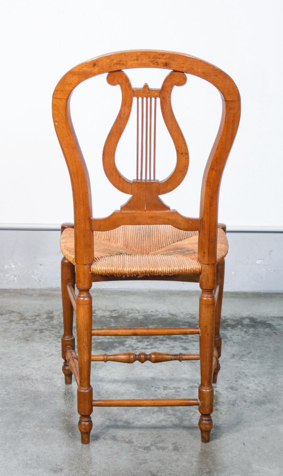 photo furniture Pair Of Cherry Wood Chairs With Lyre Shaped Back And Straw Seat, Early 20th
