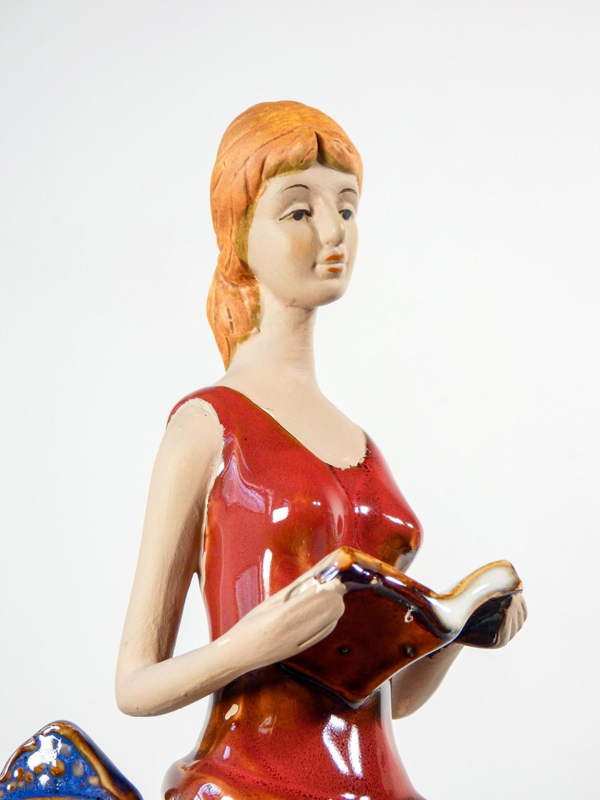 Painted And Glazed Ceramic Sculpture. Woman With Books. Italy photo for sale