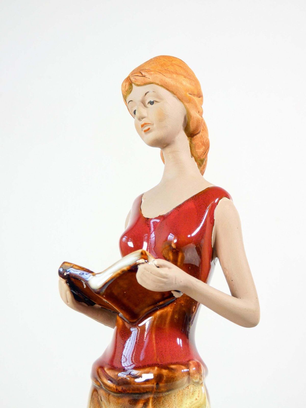 Painted And Glazed Ceramic Sculpture. Woman With Books. Italy photo vinterior