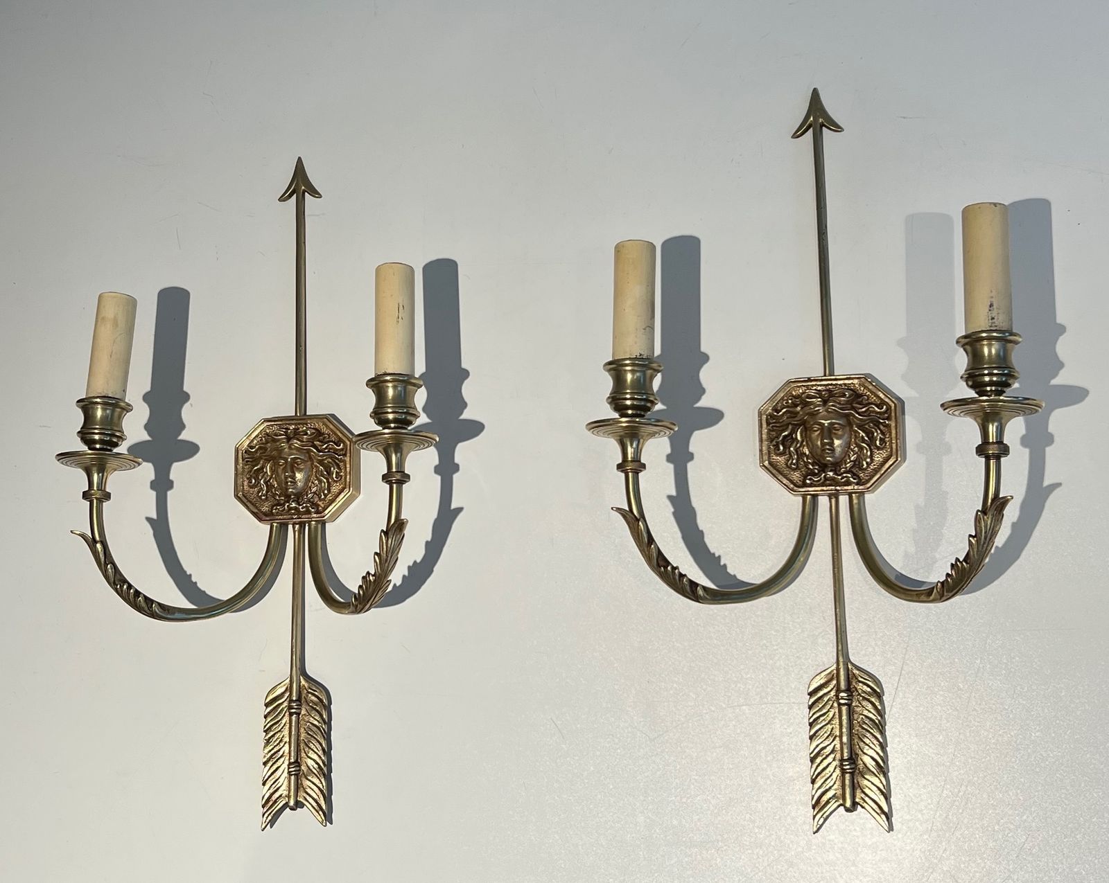 2250.0 Pair Of Bronze Wall Lights With Arrows And The Effigy Of The Sun King By Louis Gau photo