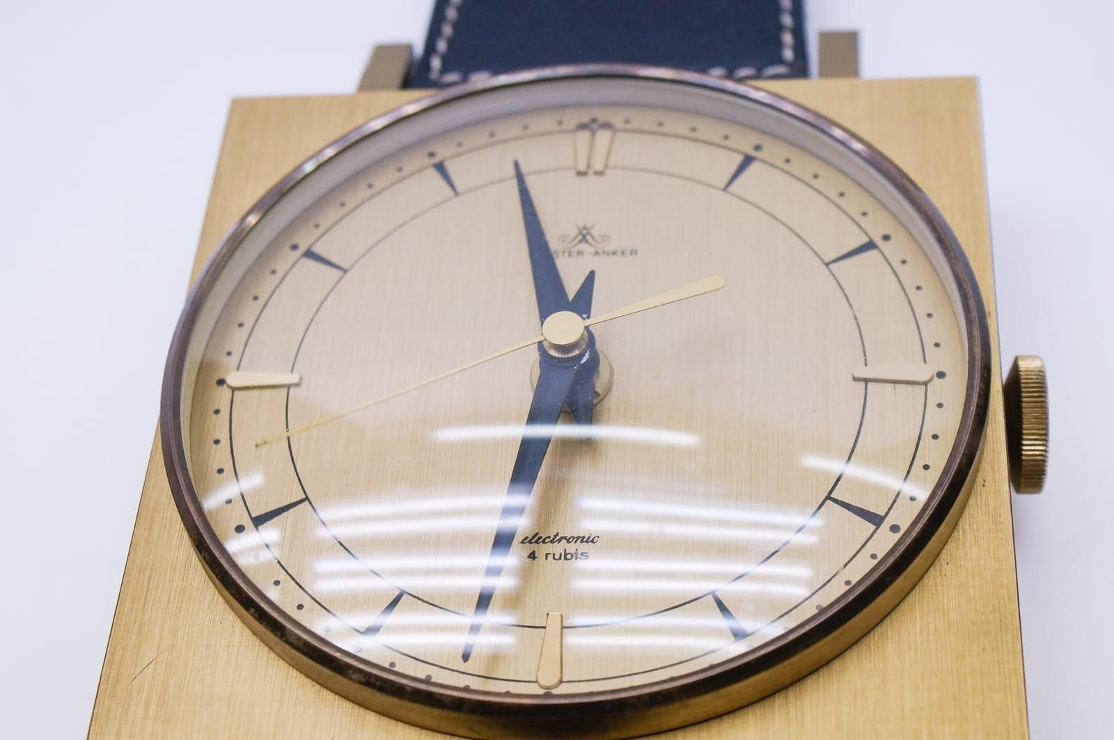 Midcentury Wall Clock In The Form Of A Wristwatch In Leather And Brass, Germany photo vintage