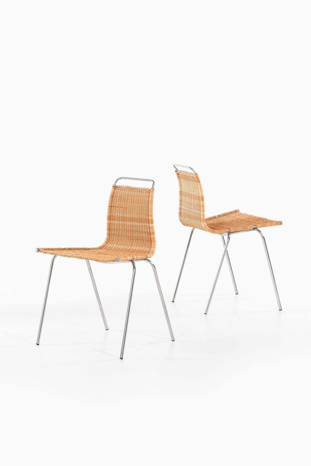 Set Of 8 Dining Chairs In Chromed Steel And Woven Cane By Poul Kjærholm, 1950's photo furniture